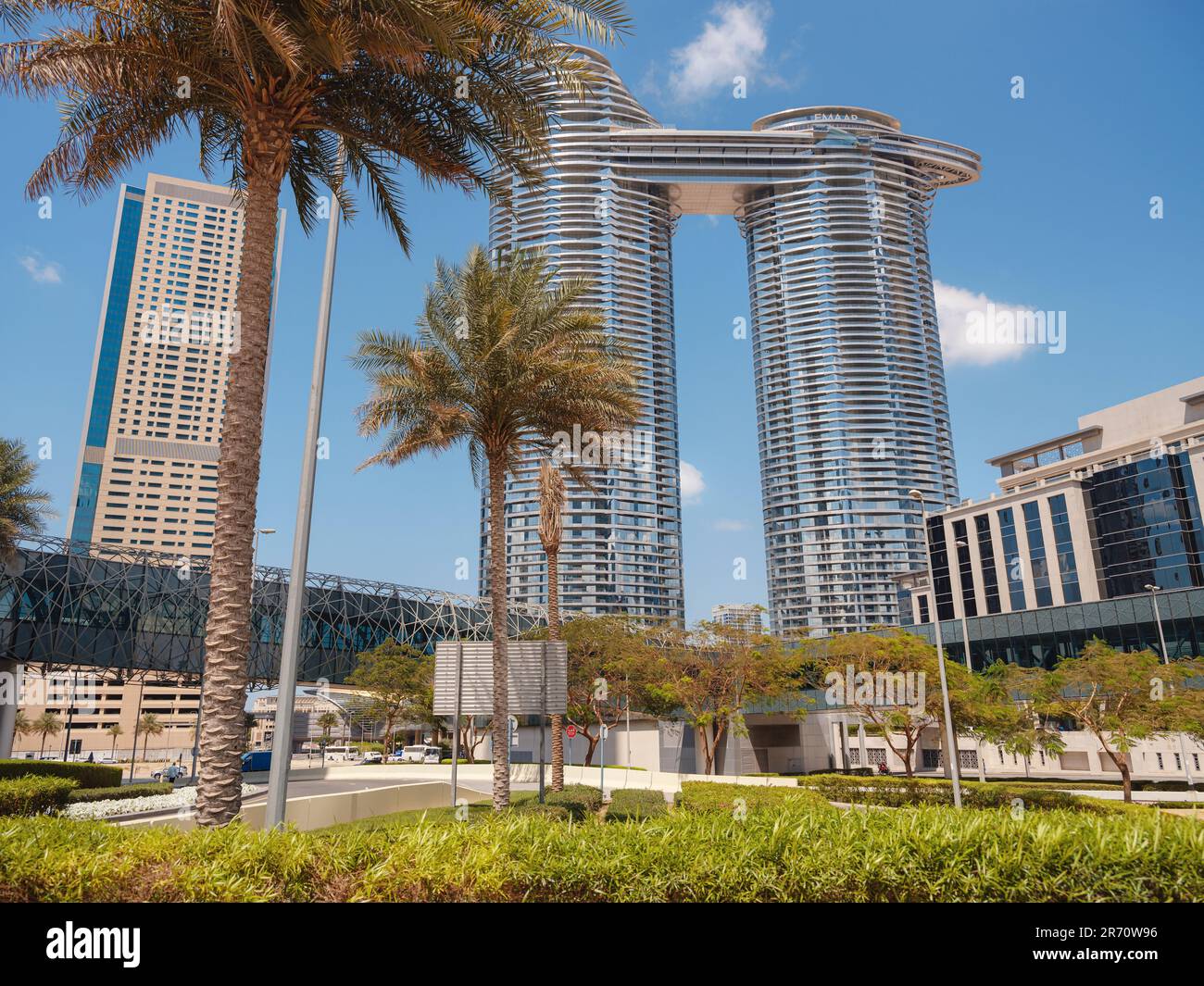23 March 2023, Dubai, UAE: Address Skyview Towers in downtown area near metro station, tourist trip to futuristic dubai Stock Photo