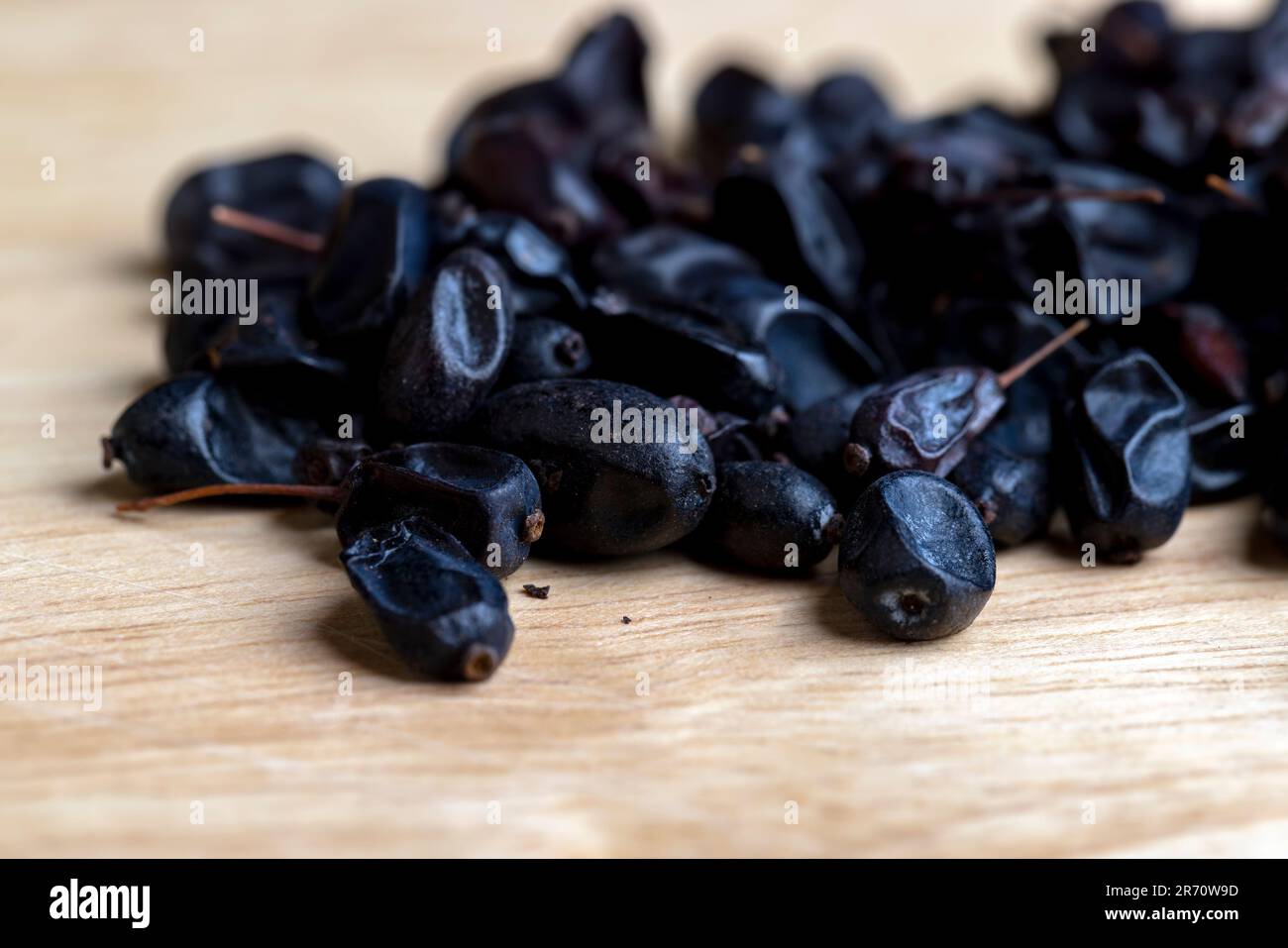 Black spices of dried barberry for cooking meat, dried barberry spice for cooking meat oriental dishes Stock Photo