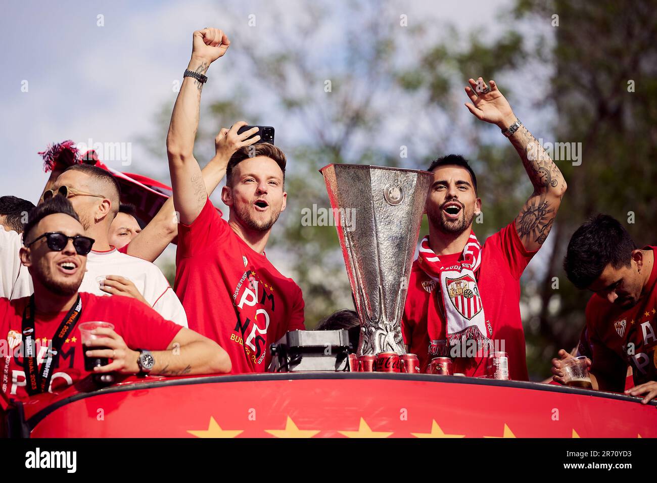 Seville, Spain. 01st, June 2023. Ivan Rakitic (L) and Suso (R) of Sevilla FC seen in celebrating with the fans after winning the seventh UEFA Europa League Final. (Photo credit: Gonzales Photo - Jesus Ruiz Medina). Stock Photo