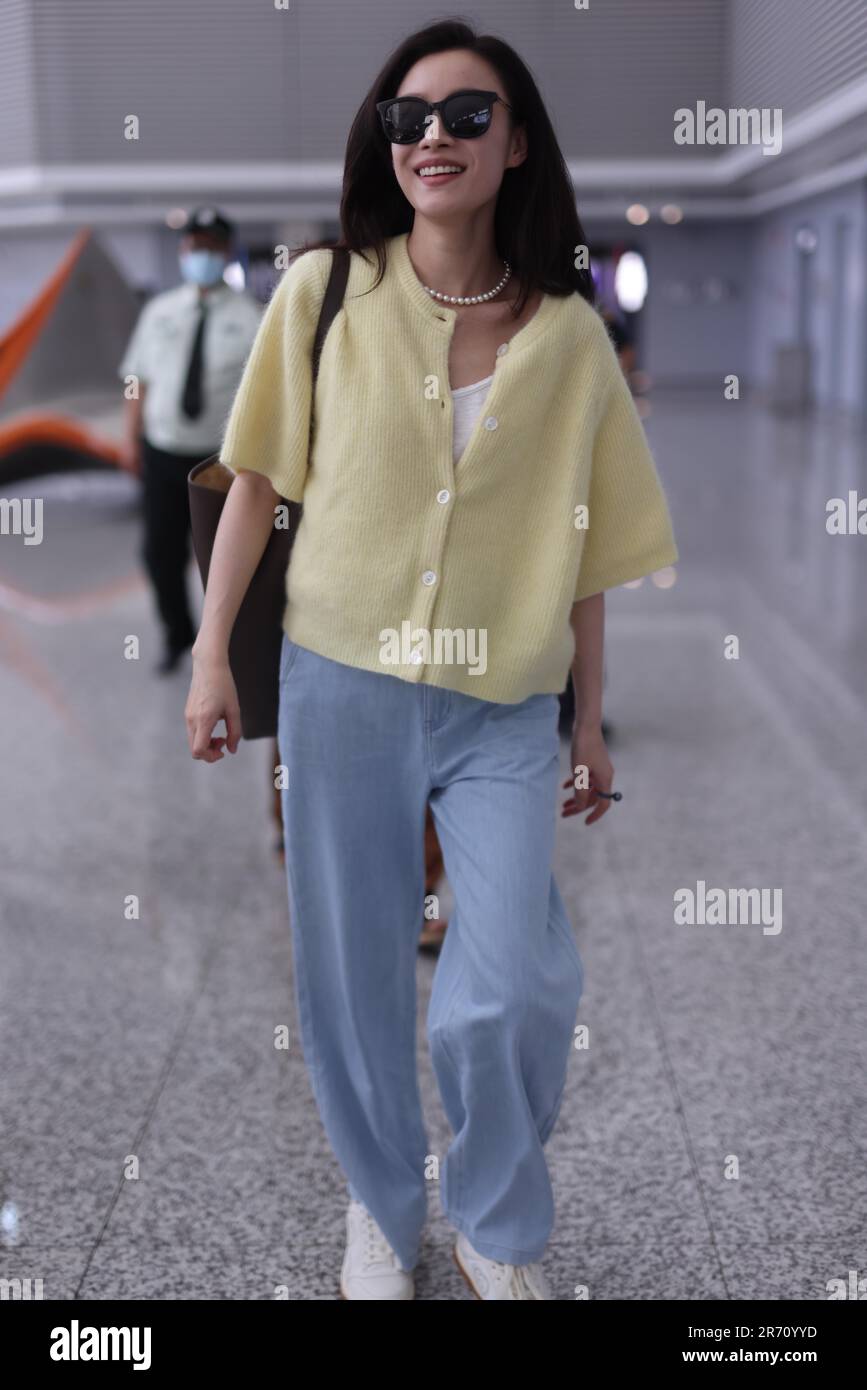 Chinese actress Ni Ni appears at airport in Shanghai, China, 10 June ...