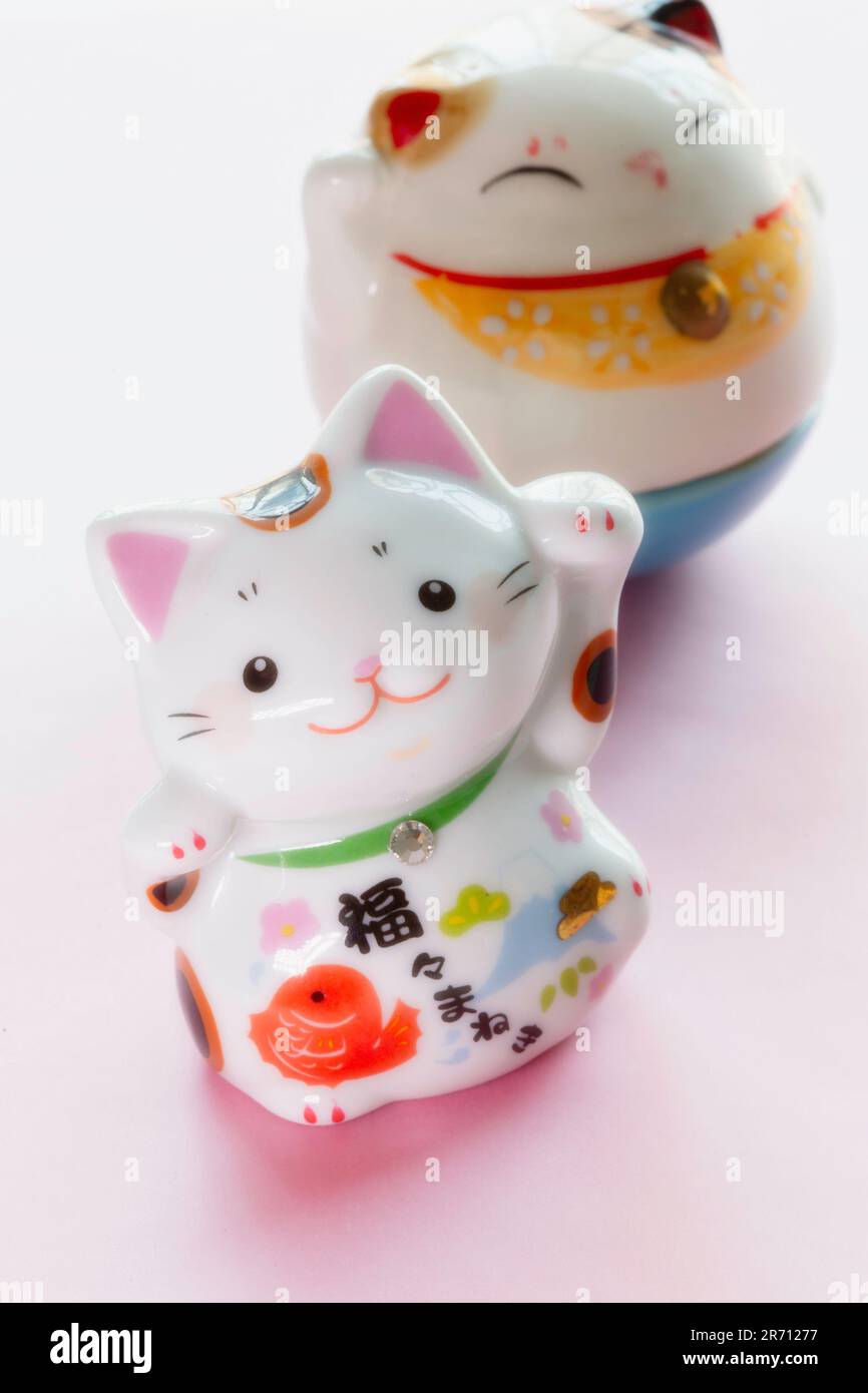 Maneki Neko, Lucky Cat Figurines Stock Photo