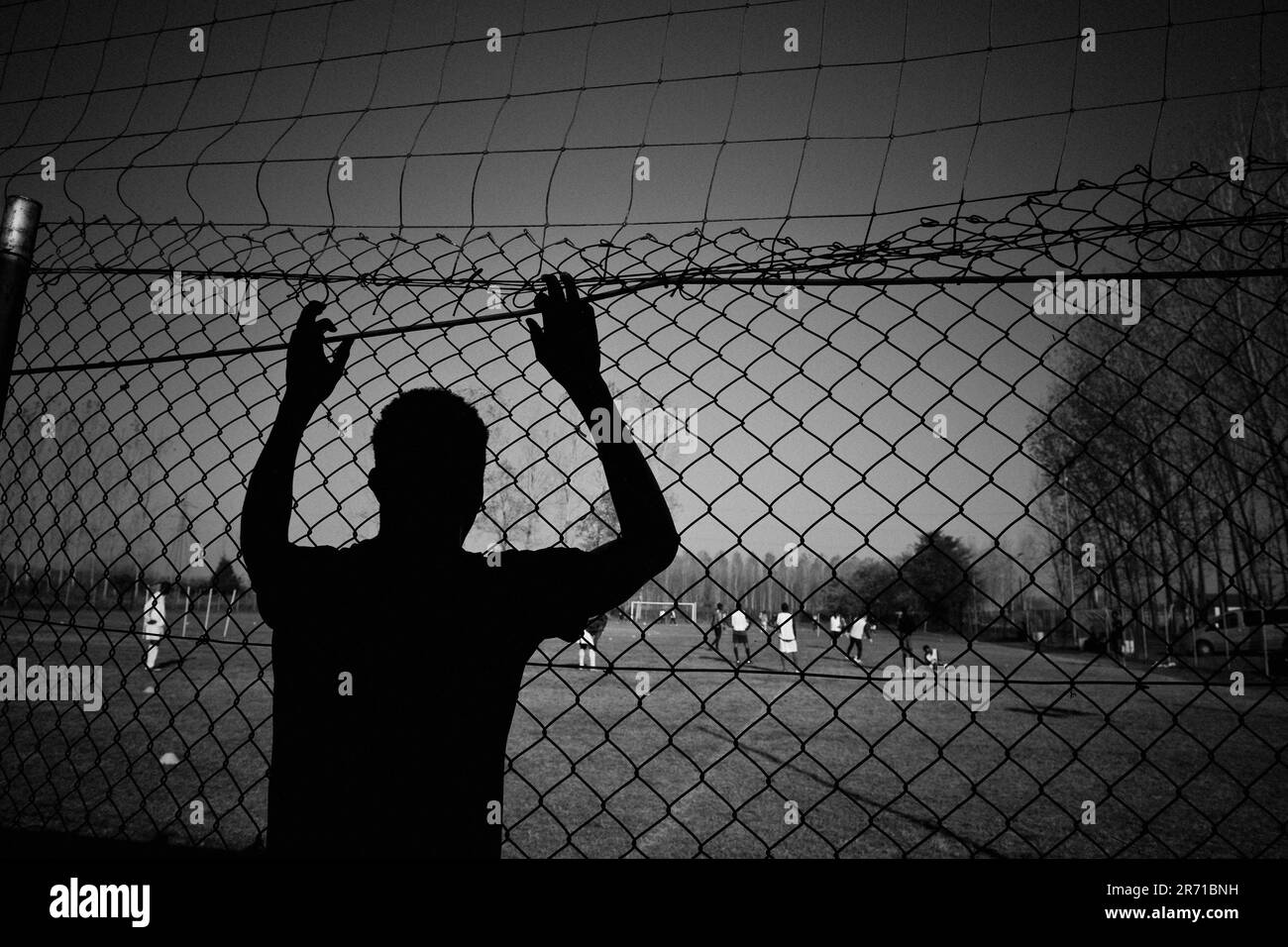 Italy. Mortara. refugee center. football training Stock Photo - Alamy