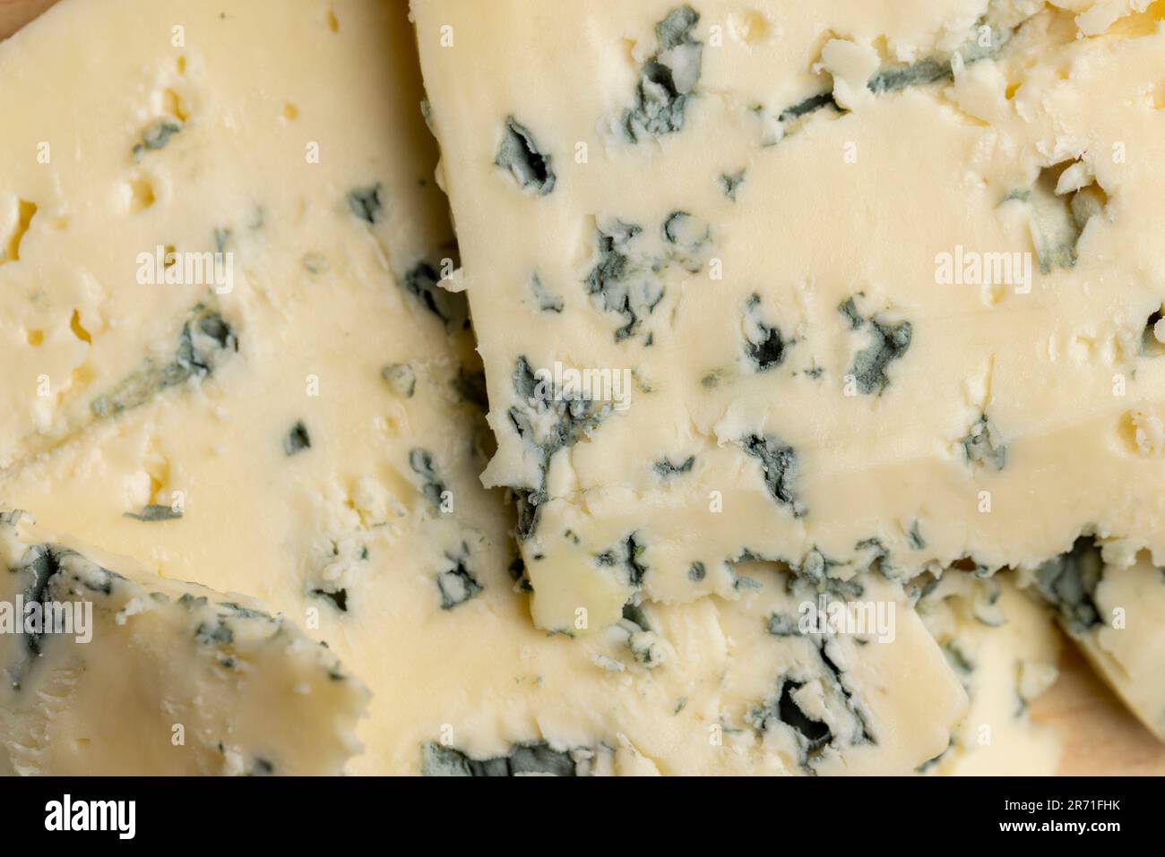 Cheese with blue mold cut into pieces, slices of cheese with blue noble mold Stock Photo Alamy