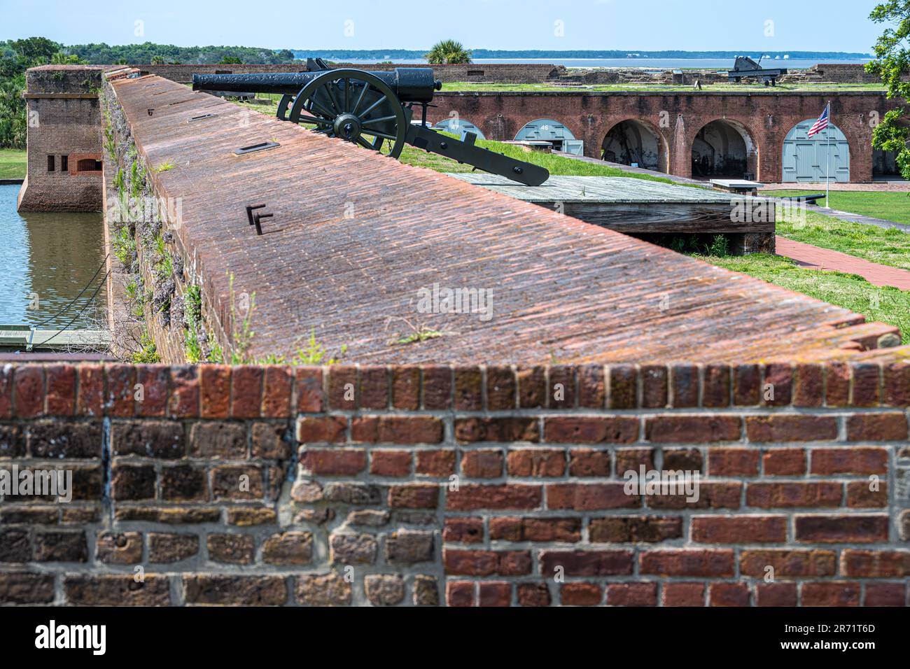 Terreplein view of courtyard and water-filled moat at Fort Pulaski on Cockspur Island along the Savannah River in Savannah, Georgia. (USA) Stock Photo