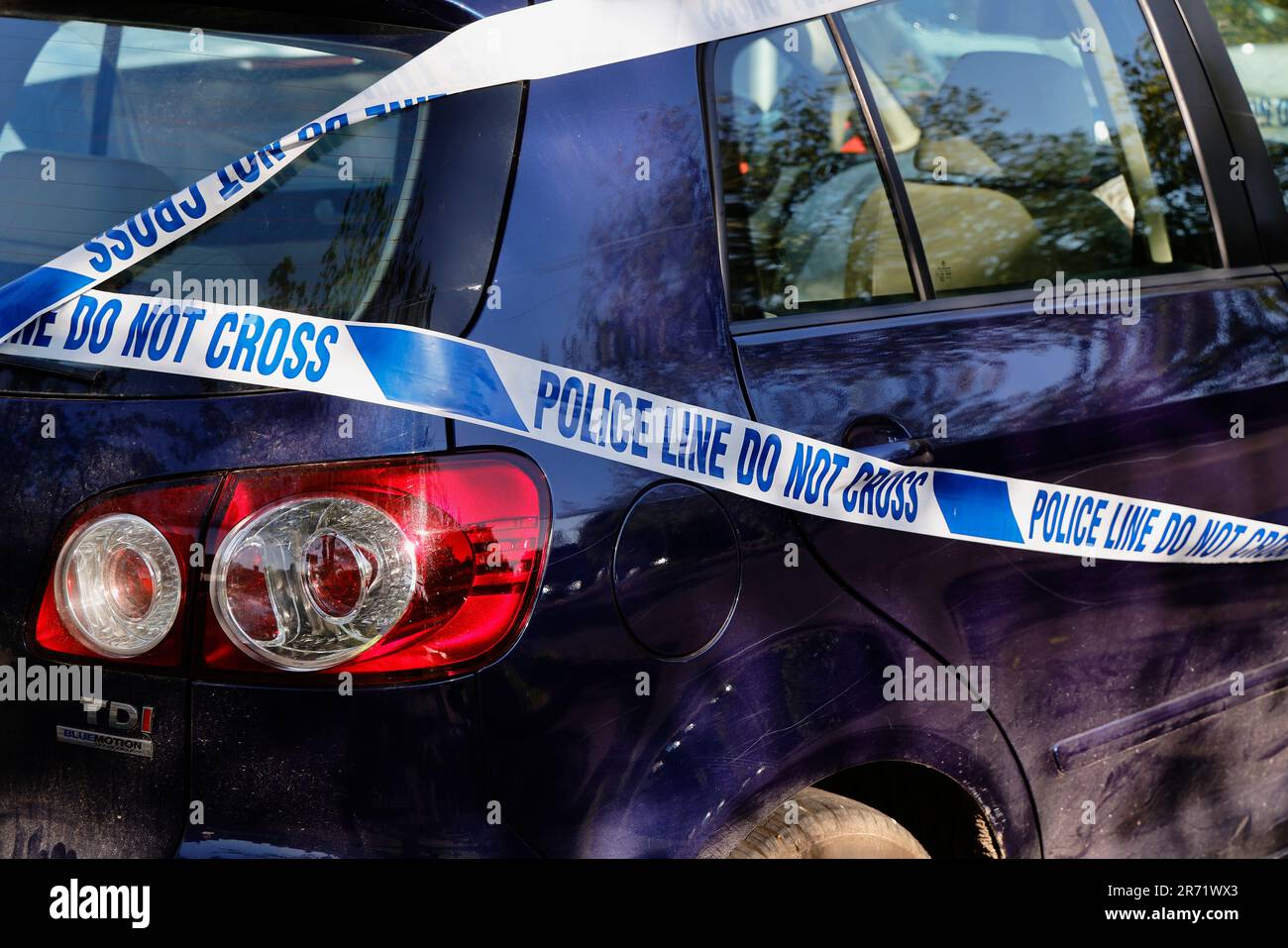 Transport, Road, Car with police tape after being involved in an accident, Cranbrook, Kent, England. Stock Photo