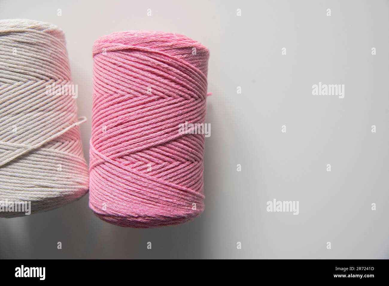 Color thread for kitting. Kitting concept.background Stock Photo - Alamy