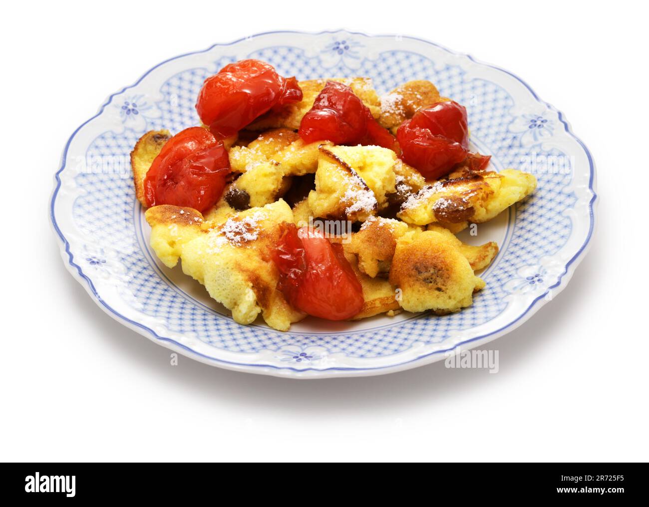 Kaiserschmarren mit Pflaumenkompott, Austrian fluffy scrambled pancake with plum compote Stock Photo