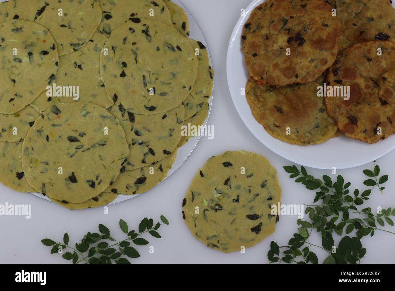 Ready to fry pressed poori made with whole wheat flour, mixed with
