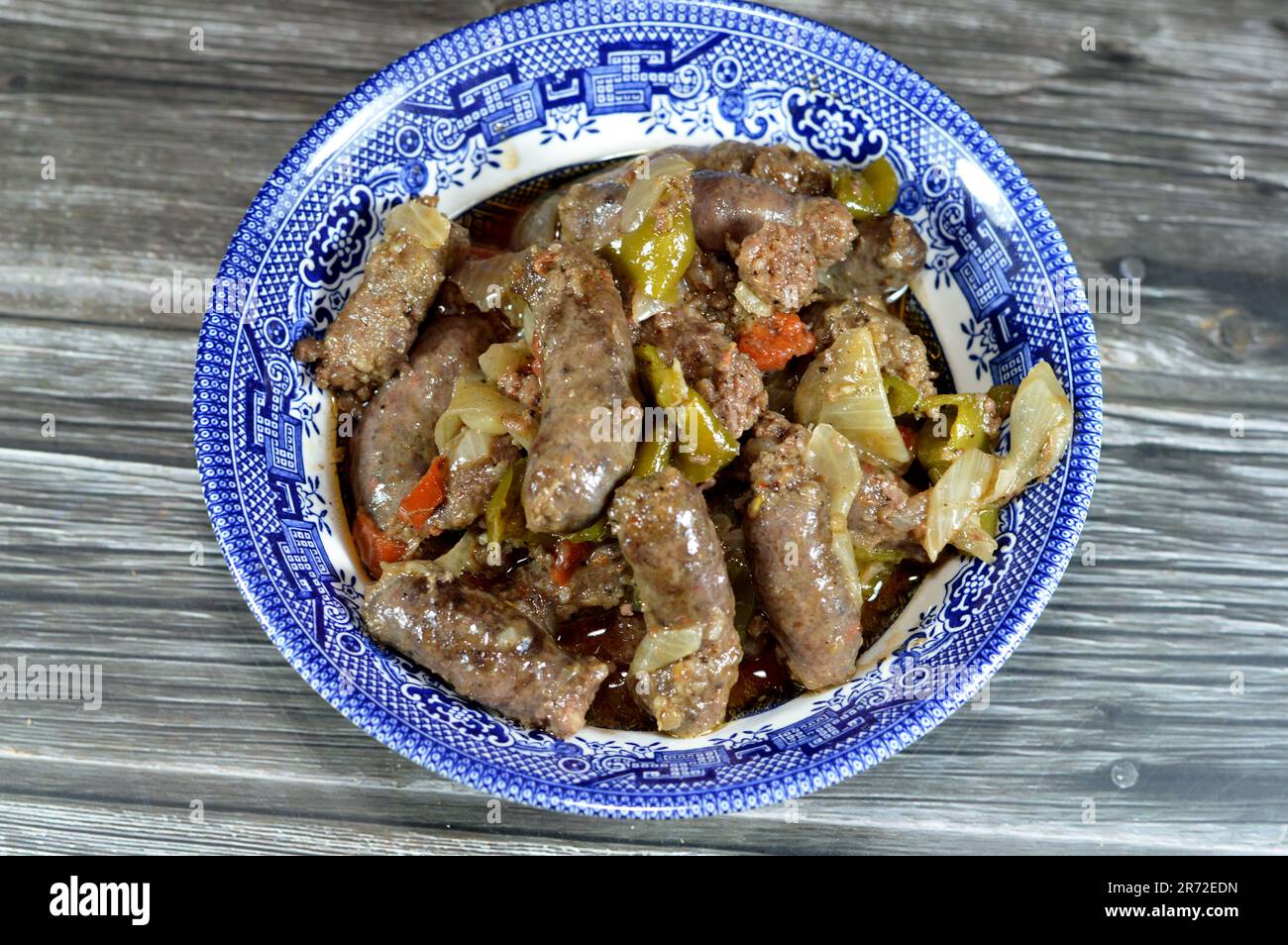 Middle Eastern cooked beef sausage, Egyptian sausages with green peppers, onion, garlic, tomato, black pepper and oil, it is a dry, spiced sausage eit Stock Photo