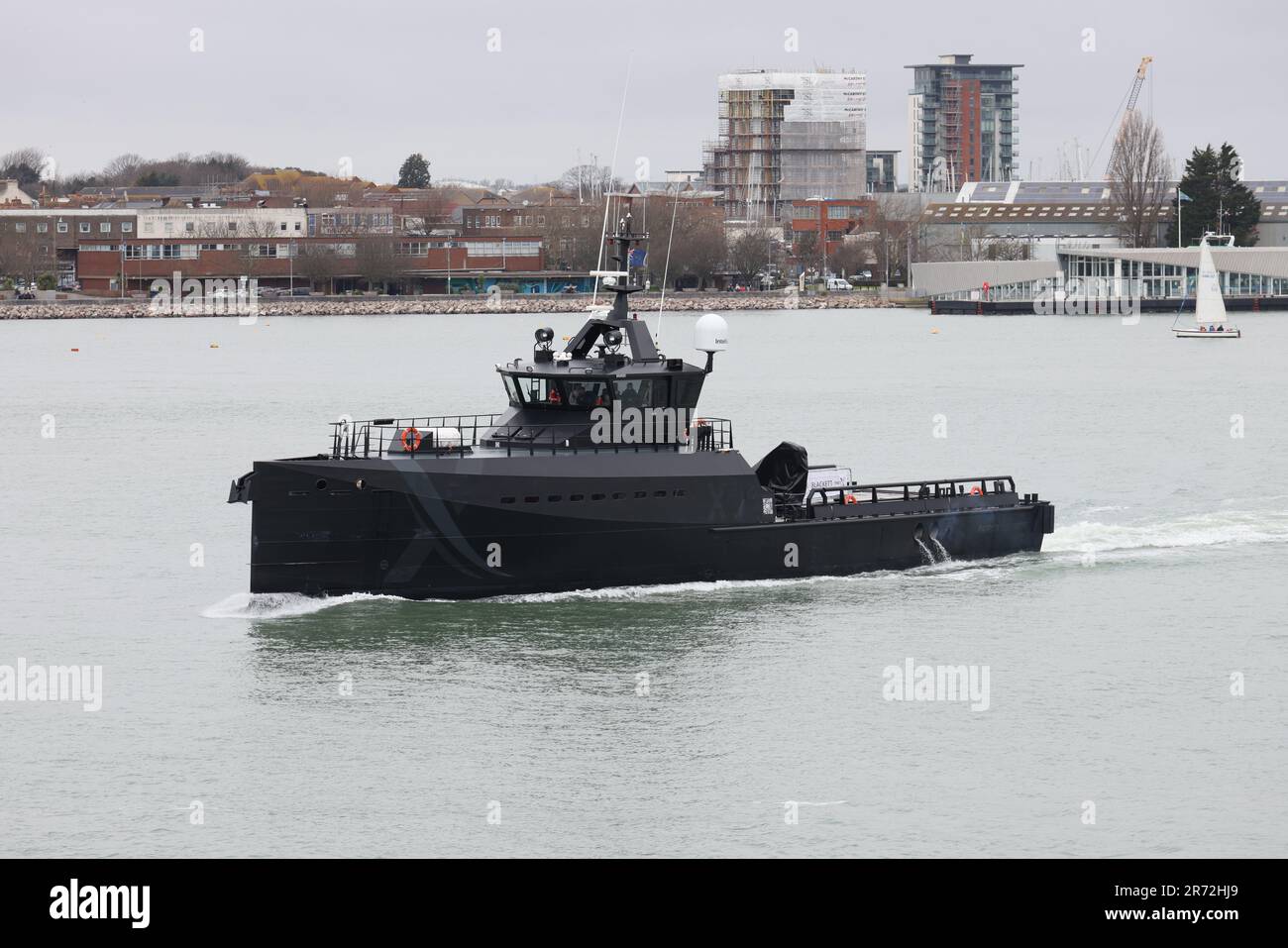 The NavyX experimental trials platform XV PATRICK BLACKETT passing Gosport on its way out of harbour Stock Photo
