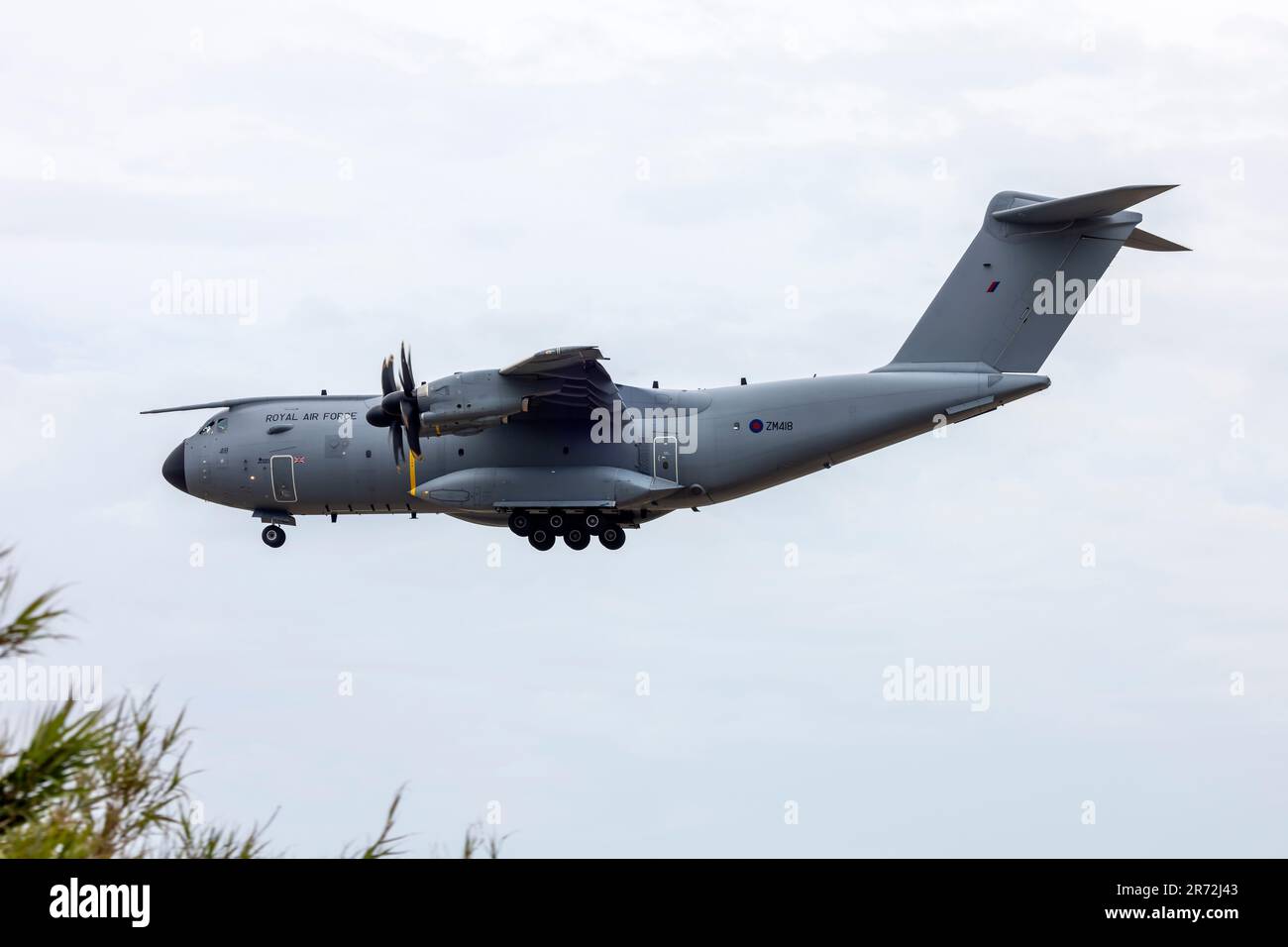 UK Air Force (RAF) Airbus A400M-180 (REG: ZM418) landing for a night stop over. Stock Photo