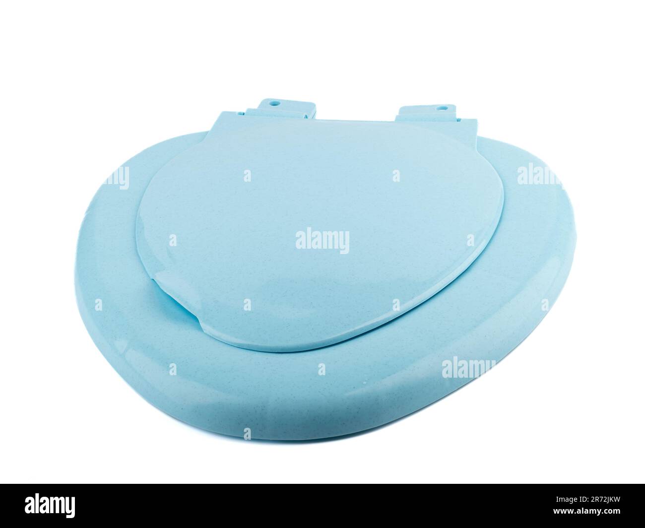 Blue toilet seat with a closed lid on a white background. Copy pace