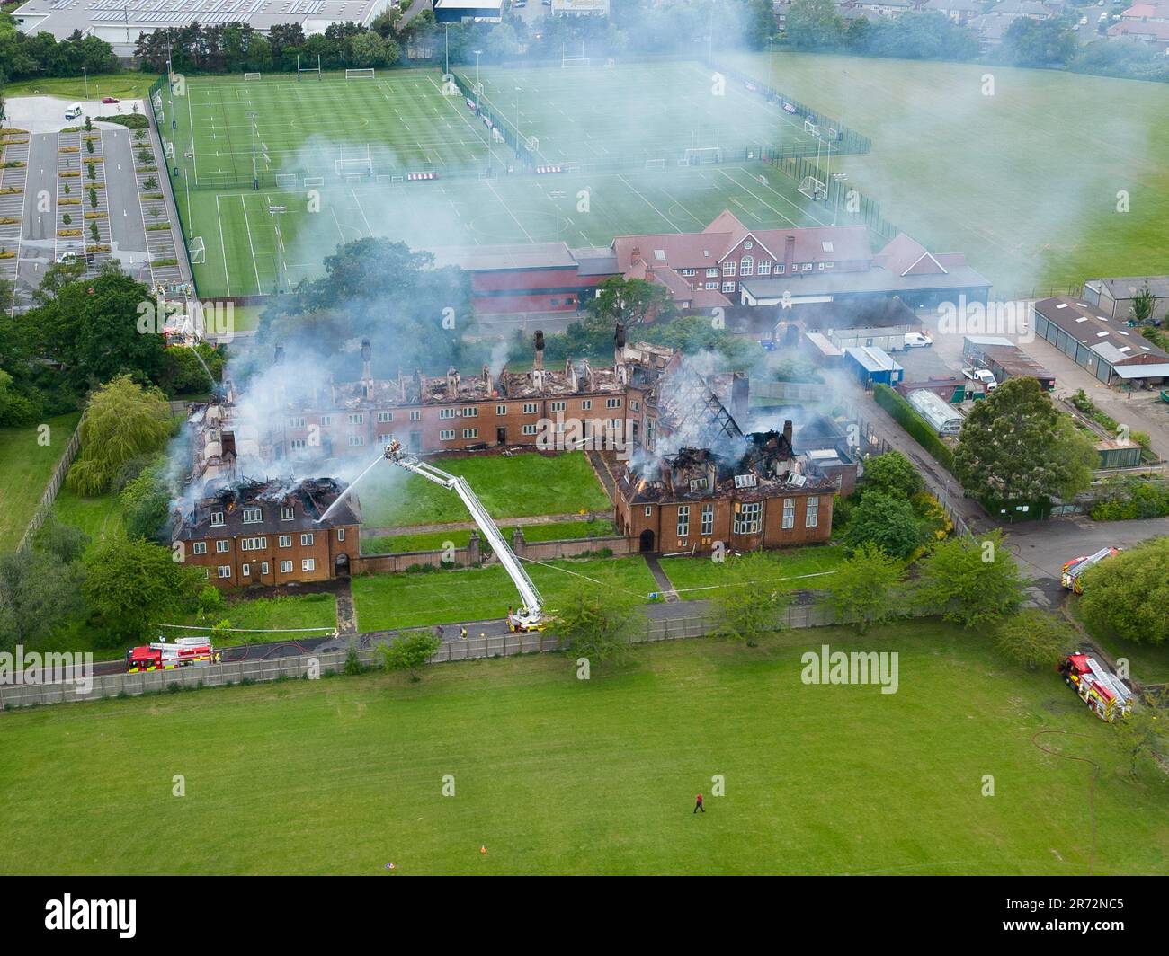 The firefighters tackle a large fire at grade two listed building Henderson Hall university accommodation in Heaton, Newcastle upon Tyne Stock Photo