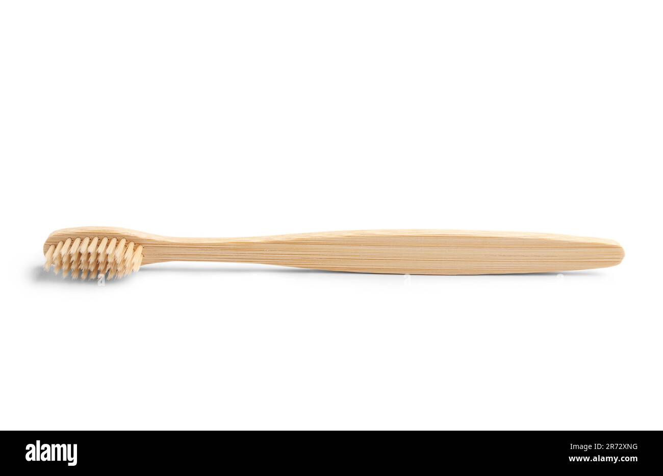 Bamboo toothbrush on white background Stock Photo - Alamy