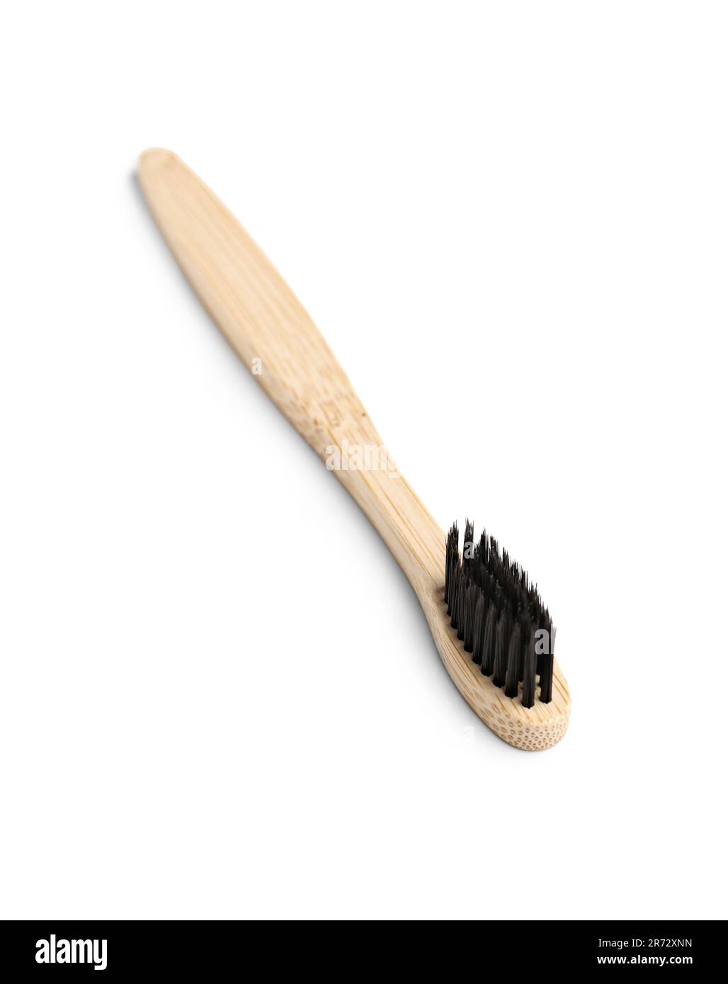 Bamboo toothbrush on white background Stock Photo - Alamy
