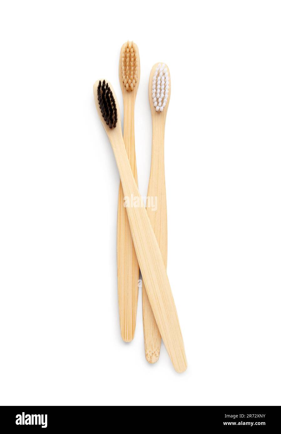 Different bamboo toothbrushes on white background Stock Photo - Alamy