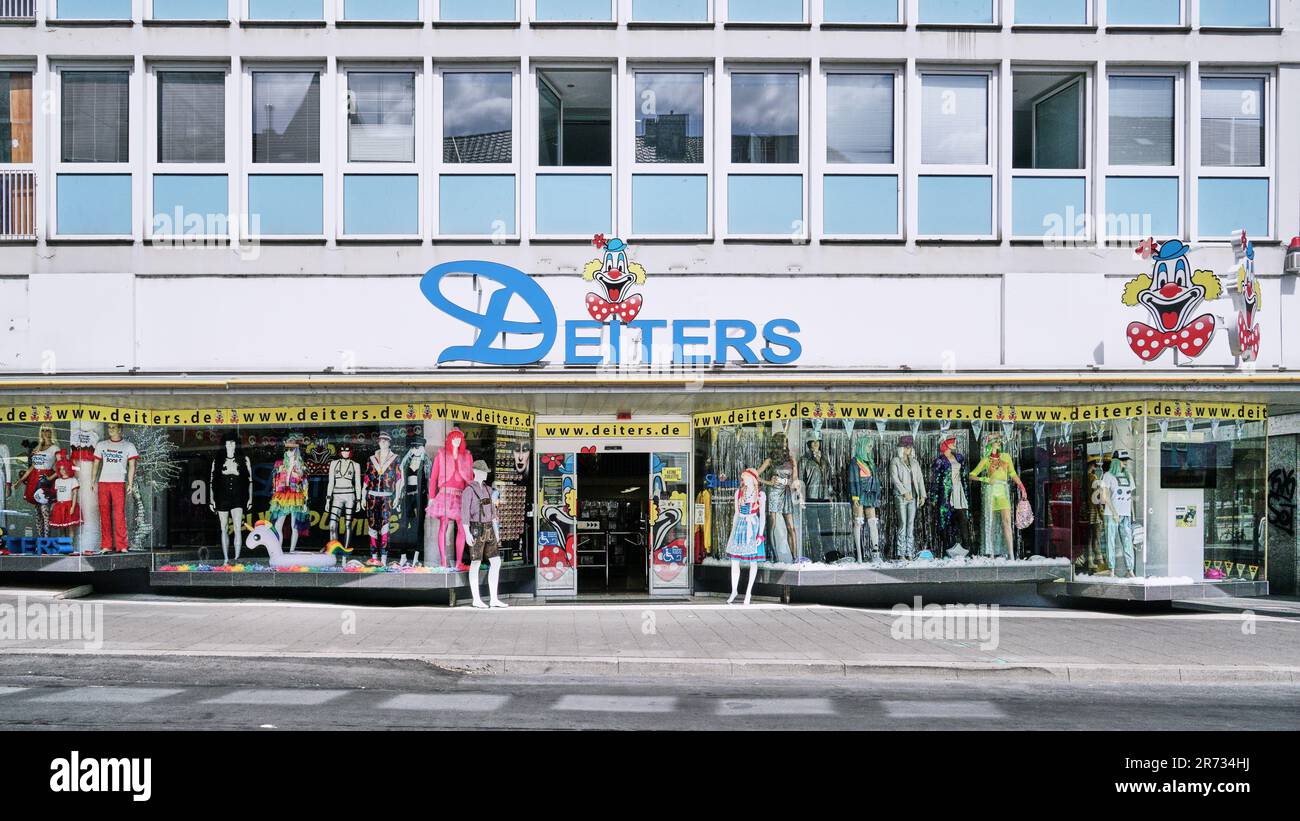 Deiters store front in Cologne, Germany. Selling wild costumes for the yearly February festival called Carnival.  Every conceivable outfit available. Stock Photo