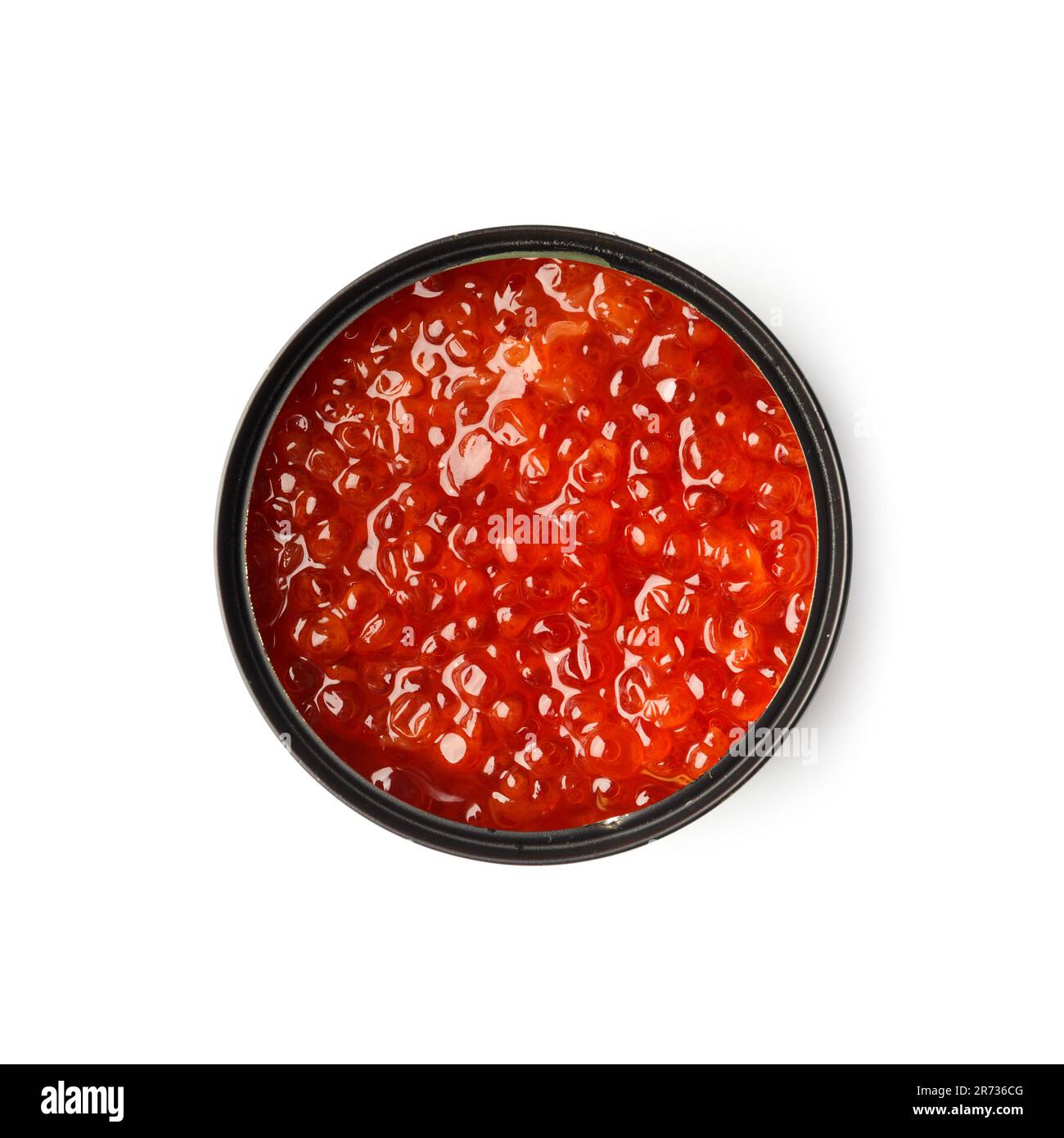 Red salmon caviar in an open black tin can on a white background top