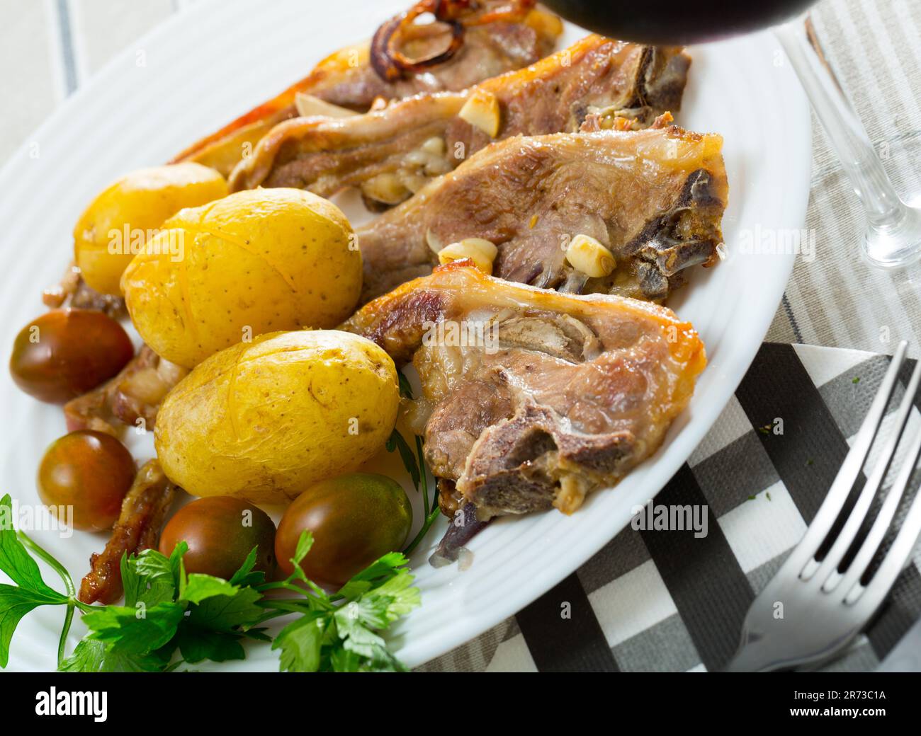 Roasted lamb ribs with potato Stock Photo