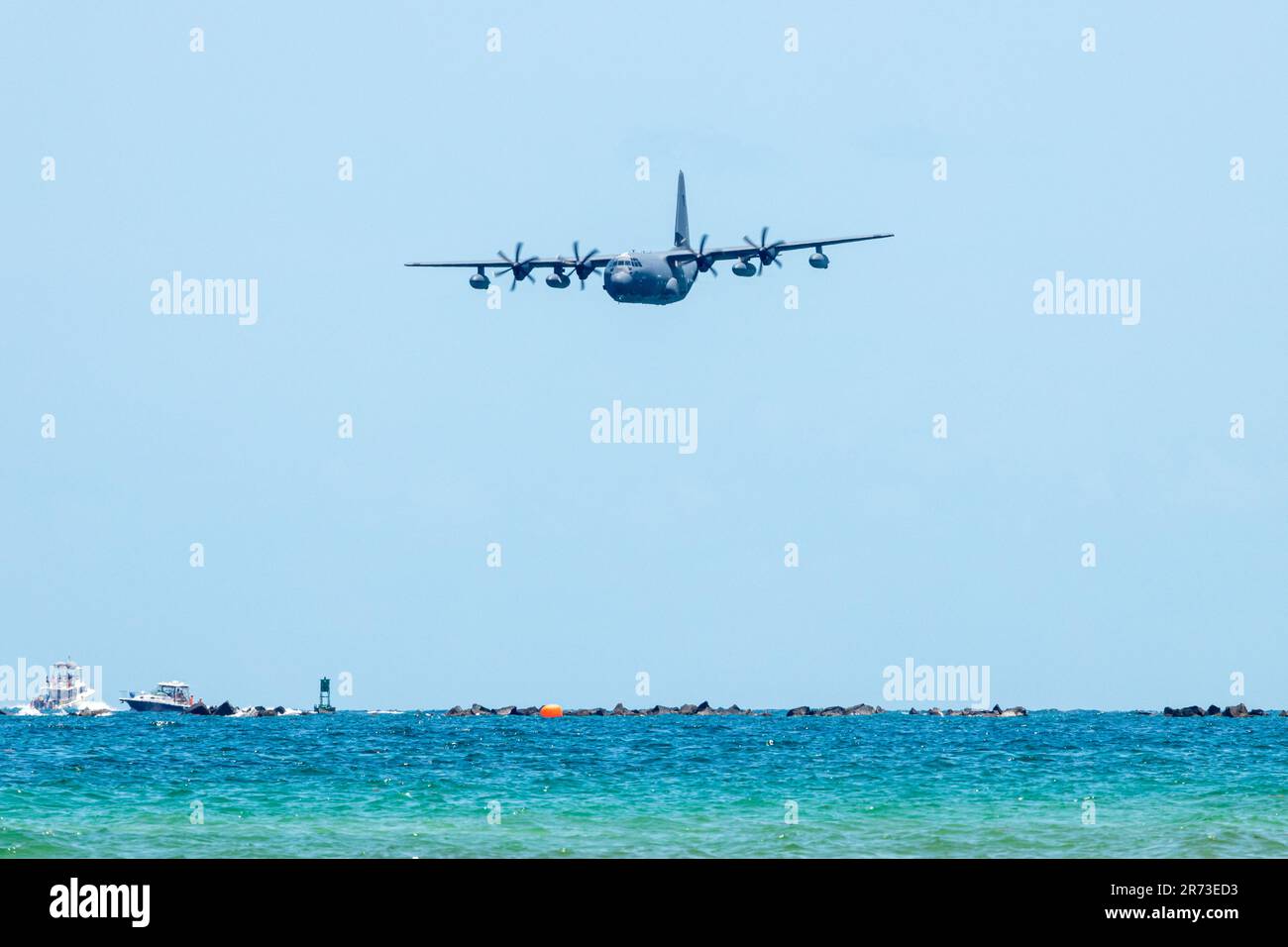 The amazing Hercules flying over the ocean Stock Photo Alamy