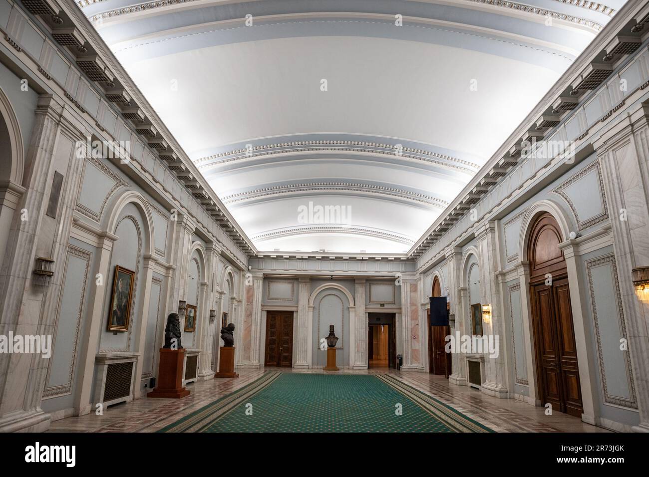 Picture of the interior of the Romanian palace of parliament, with a focus on a lobby hall. The Palace of the Parliament, also known as the Republic's Stock Photo