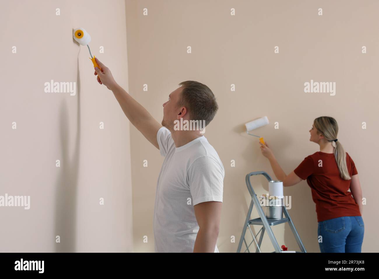 Gallery Detail: DIY Maintenance Painting Couple Hi Res Stock Photography And Images