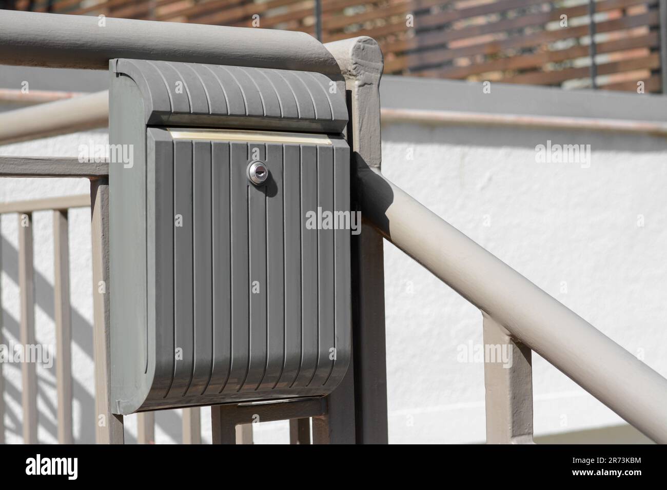 Beautiful metal letter box on railing outdoors Stock Photo Alamy