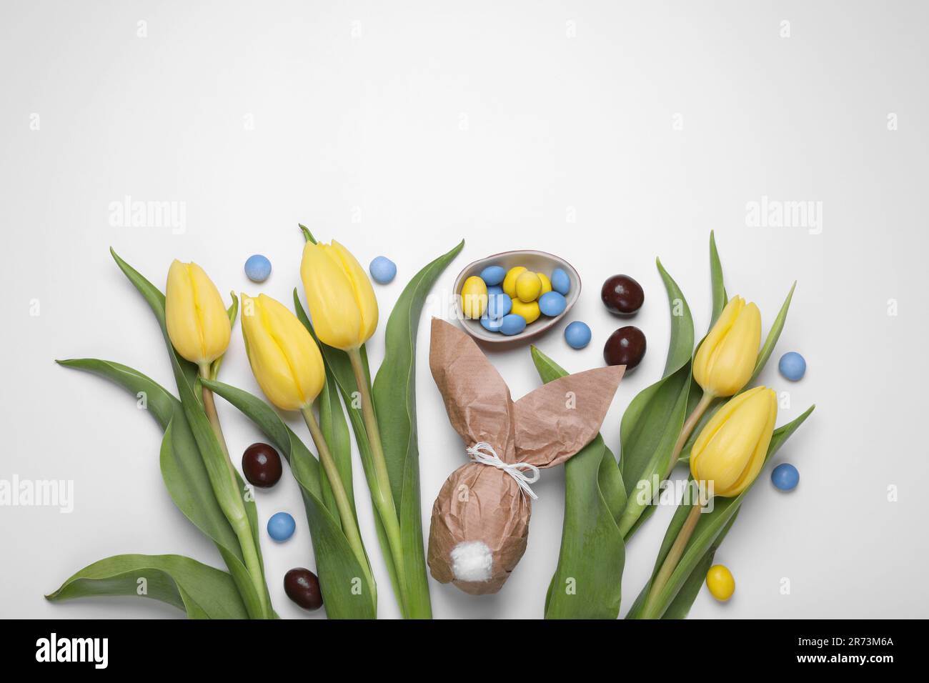 Flat lay composition with Easter bunny made of paper and egg on white ...