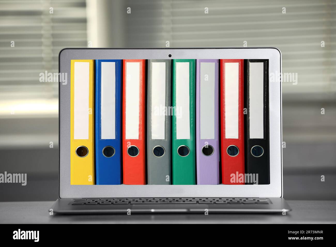 Store and organize information. Modern laptop with hardcover office