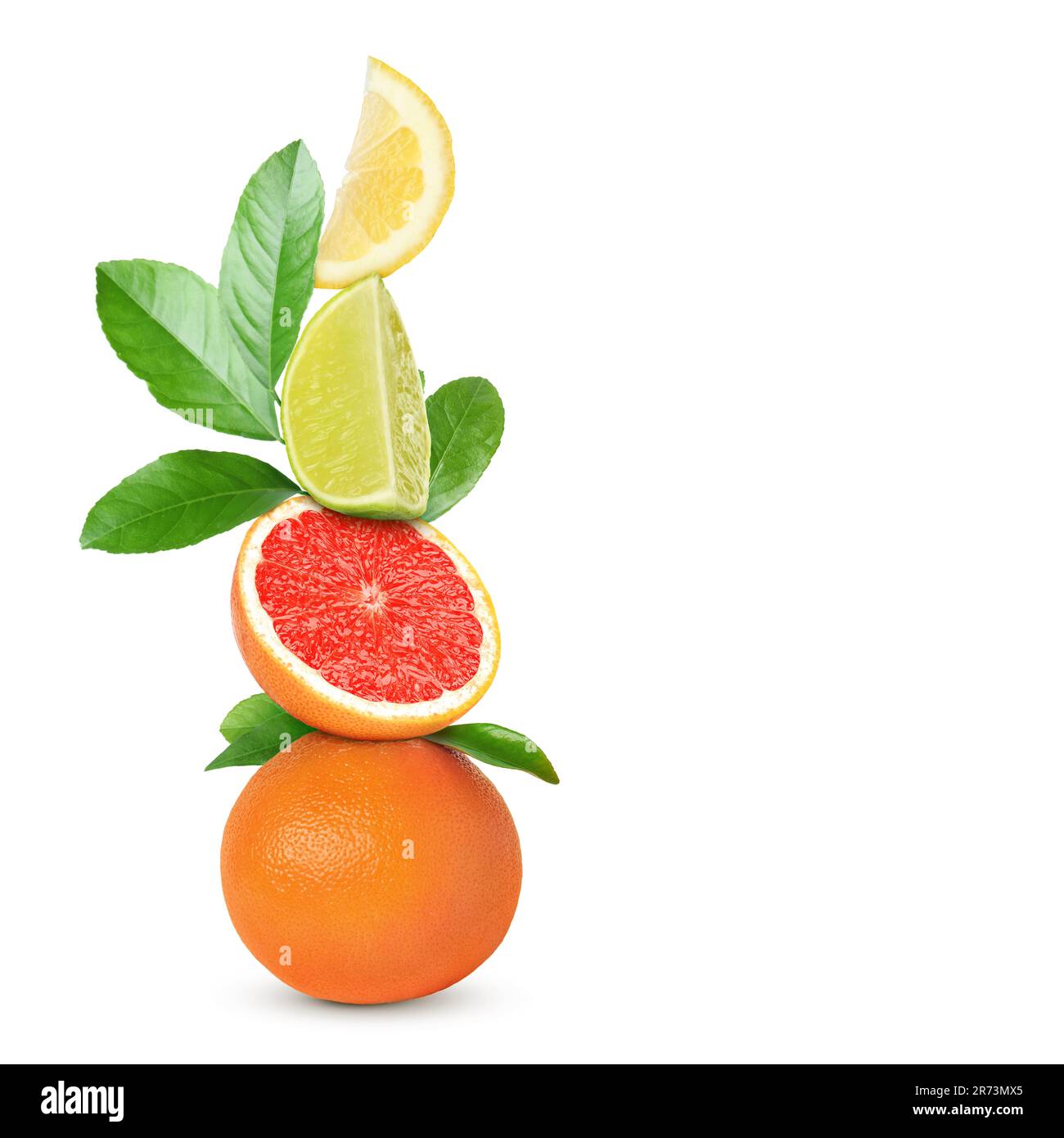 Stack of different fresh citrus fruits with green leaves on white