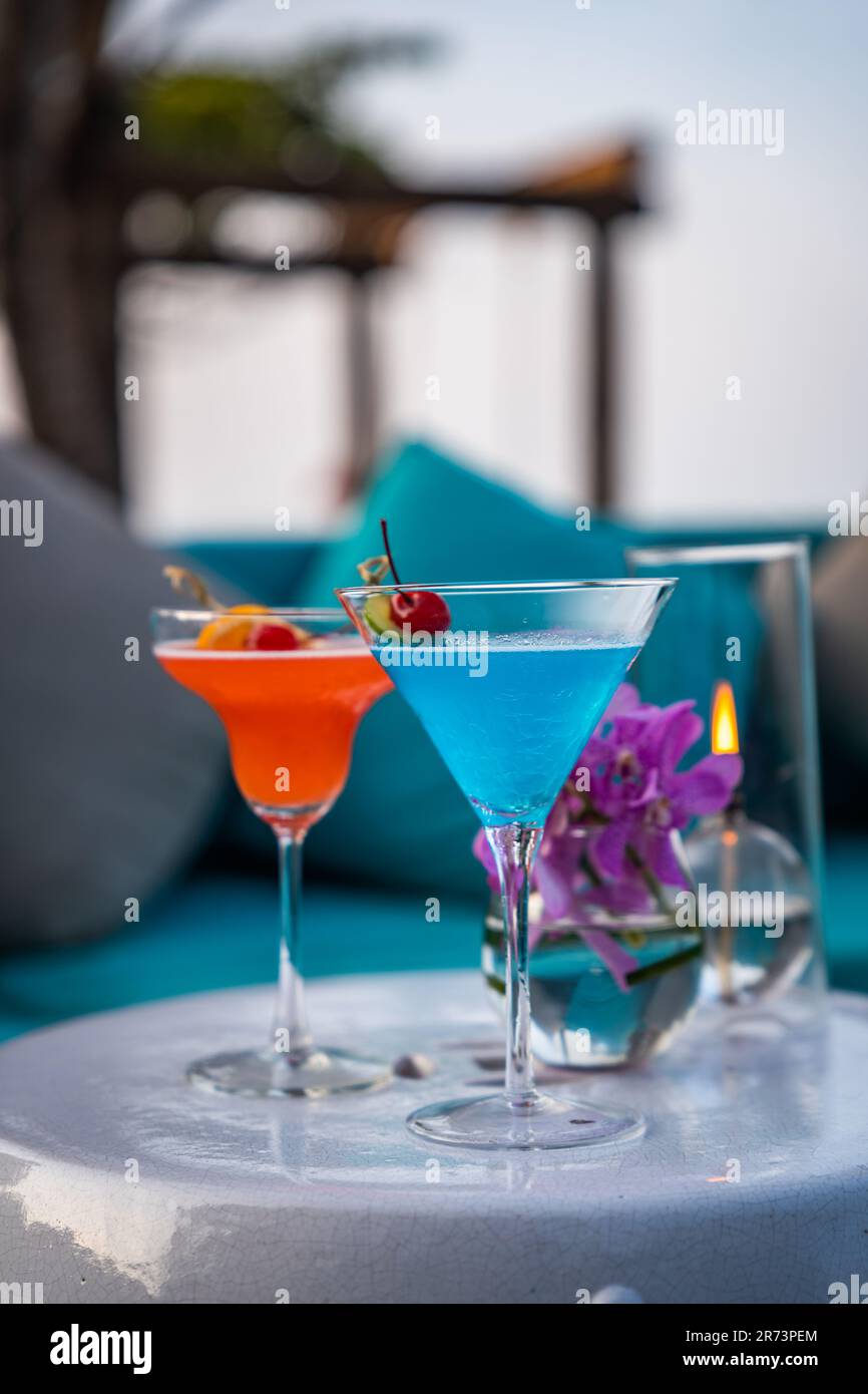 Two cocktails blue and orange at a beach bar in Hua Hin, Thailand Stock ...