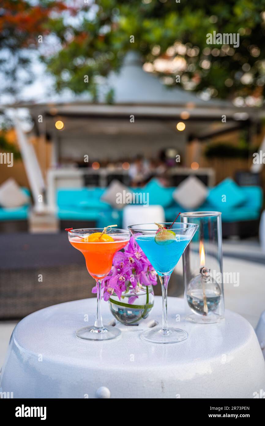 Two cocktails blue and orange at a beach bar in Hua Hin, Thailand Stock ...
