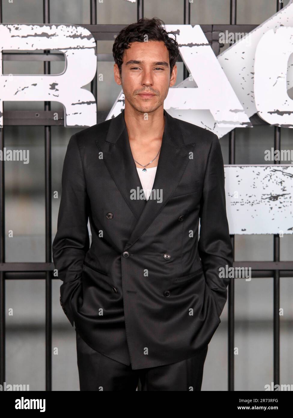 Actor Adam Bessa attends the premiere of “Extraction 2” at Jazz at