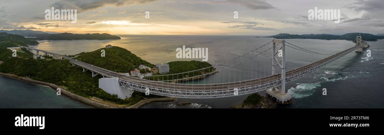 Panoramic aerial view of Onaruto Bridge and whirlpools at sunset Stock Photo