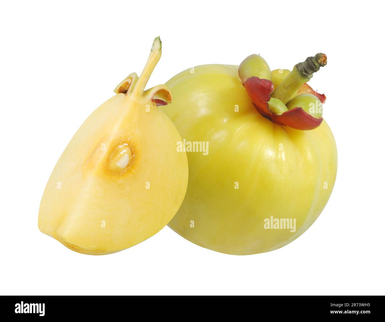 Garcinia atroviridis fruit isolated on white background Stock Photo