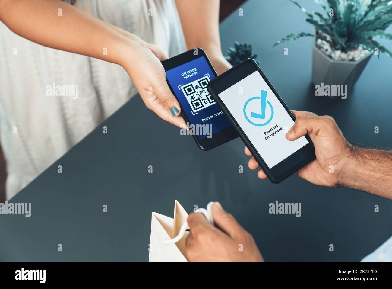 QR code displayed on screen for cashless payment scanning. Closeup ...