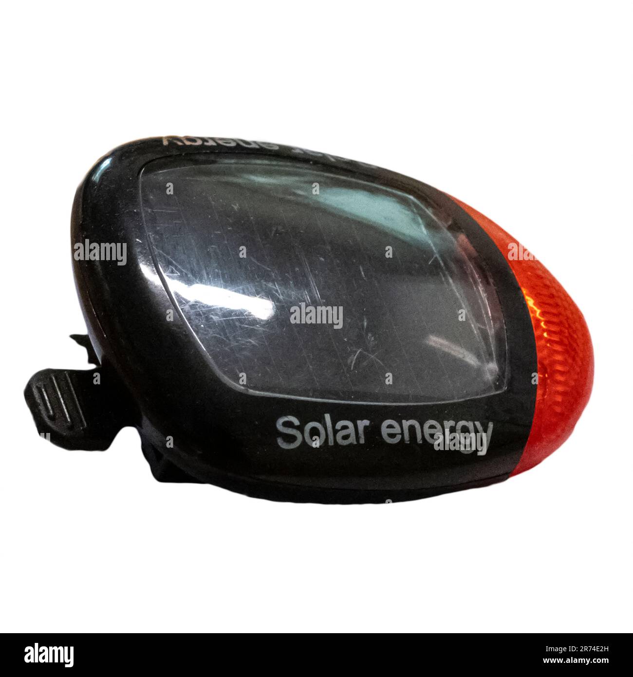 Solar charged bicycle rear red light cut out on white background Stock Photo