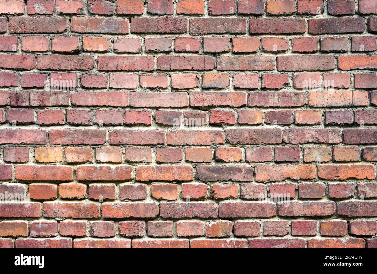 Old red brick wall. Background. Stone wall. Stock Photo