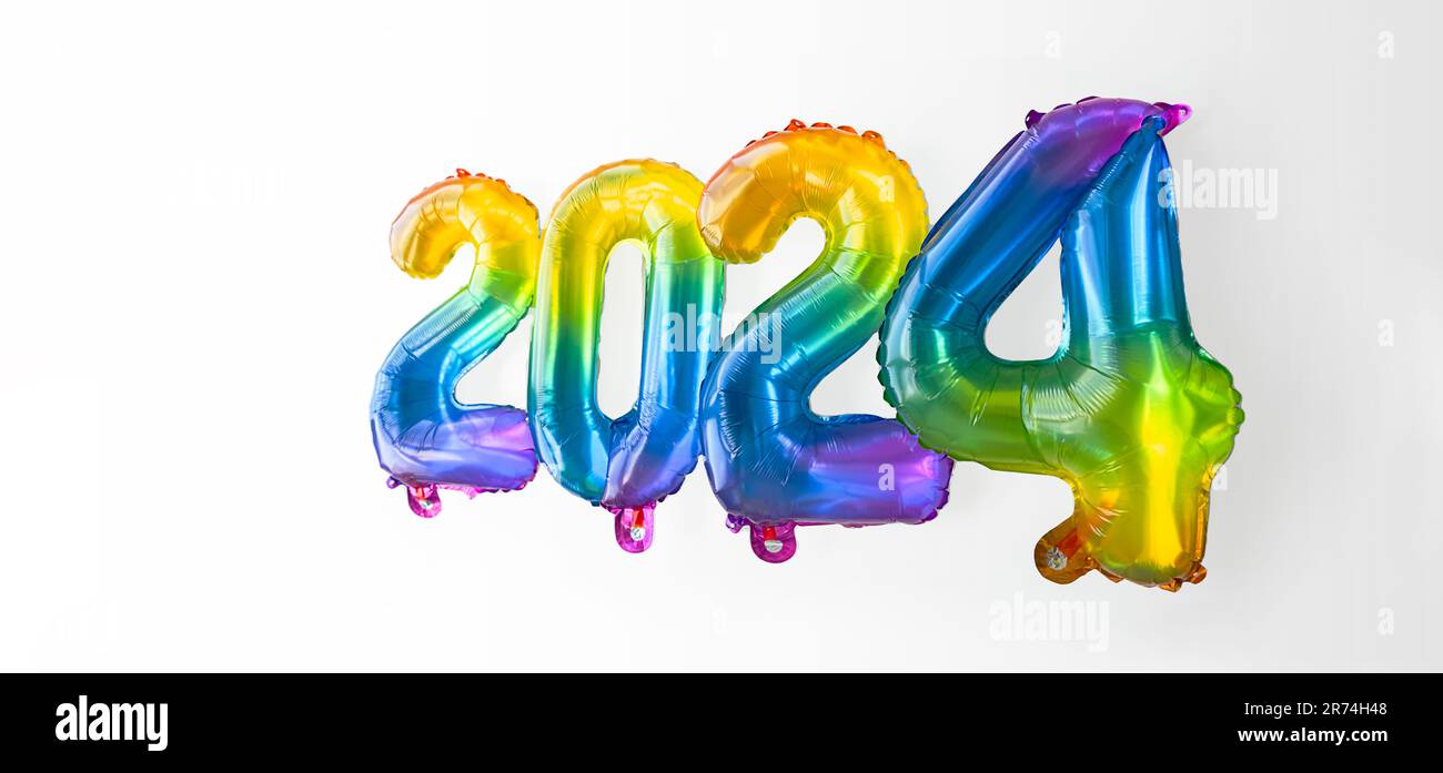 2025 New Year concept by rainbow foil balloons numbers Stock Photo Alamy