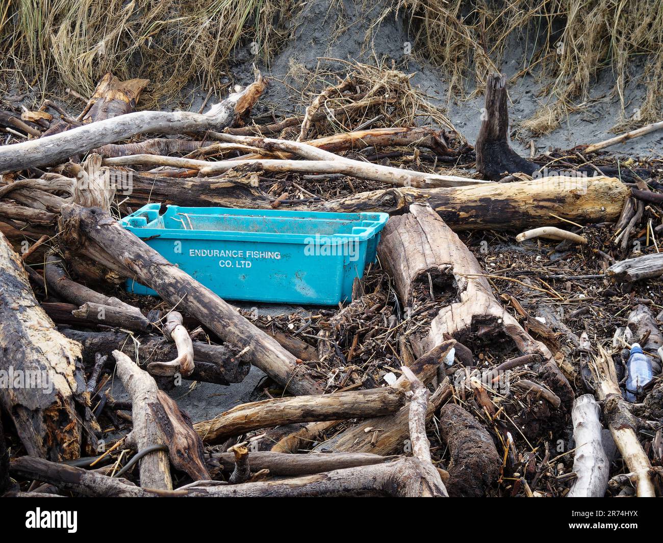 Plastic fishing industry waste washed up on a west coast beach, south island, Aotearoa / New Zealand. Stock Photo