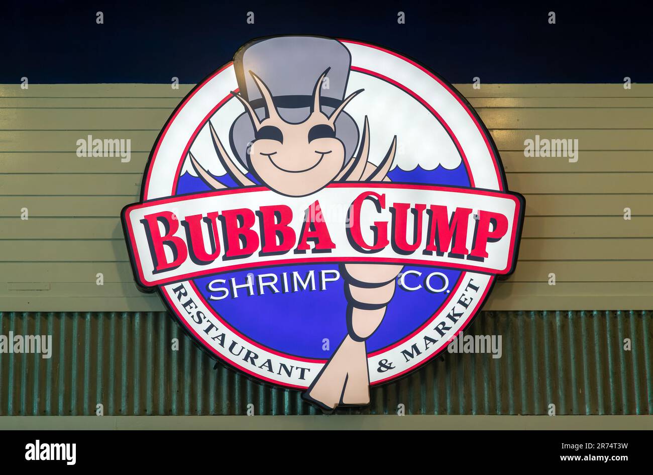 Electronic sign for Bubba Gump shrimp restaurant inside Cancun airport, Mexico Stock Photo