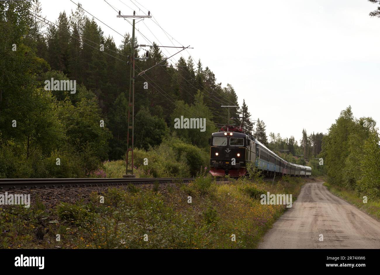 BRUNFLO, SWEDEN ON AUGUST 07, 2015. High-Speed State Company, SJ crosses the forest landscape. Gravel road, Editorial use. Stock Photo