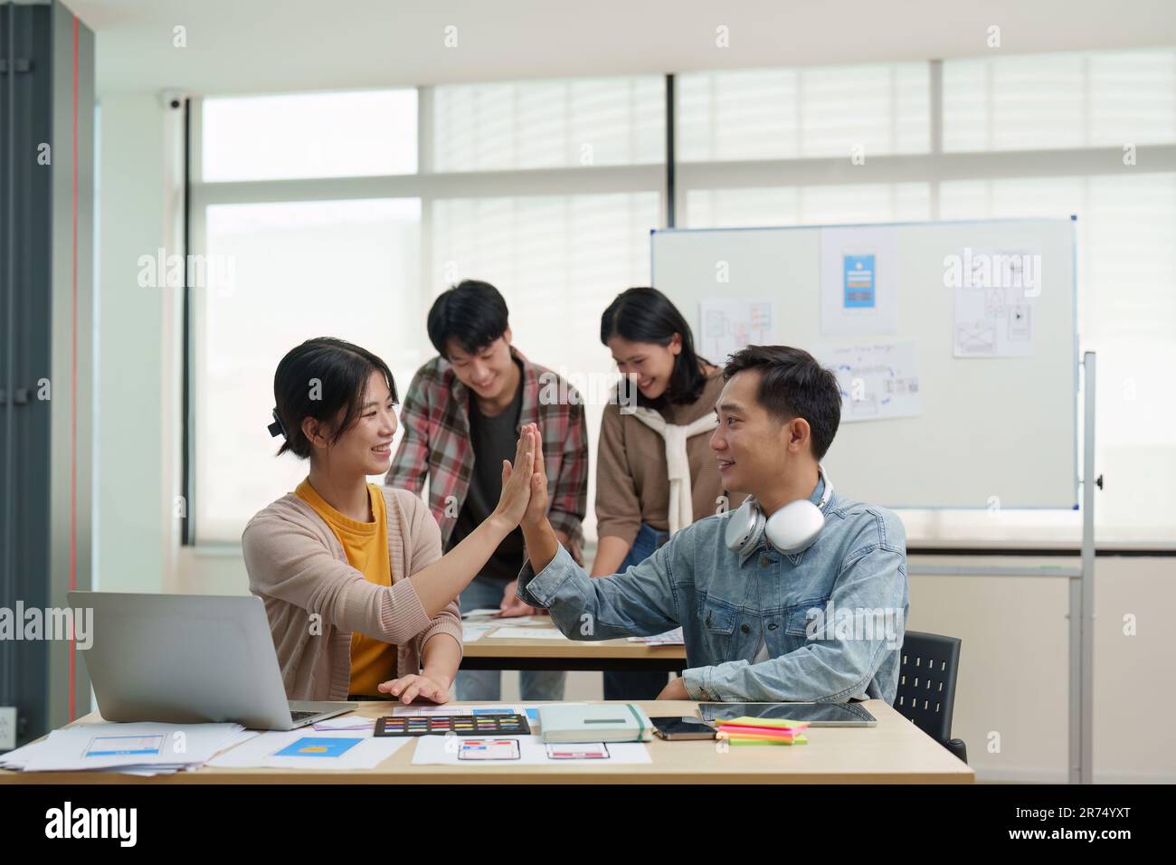 Team of ux developer and ui designer brainstorming interface wireframe ...