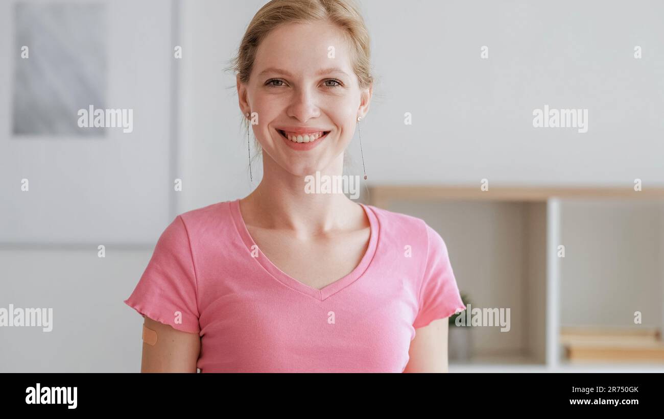 Toothy smile good mood cheerful girl patch arm Stock Photo - Alamy