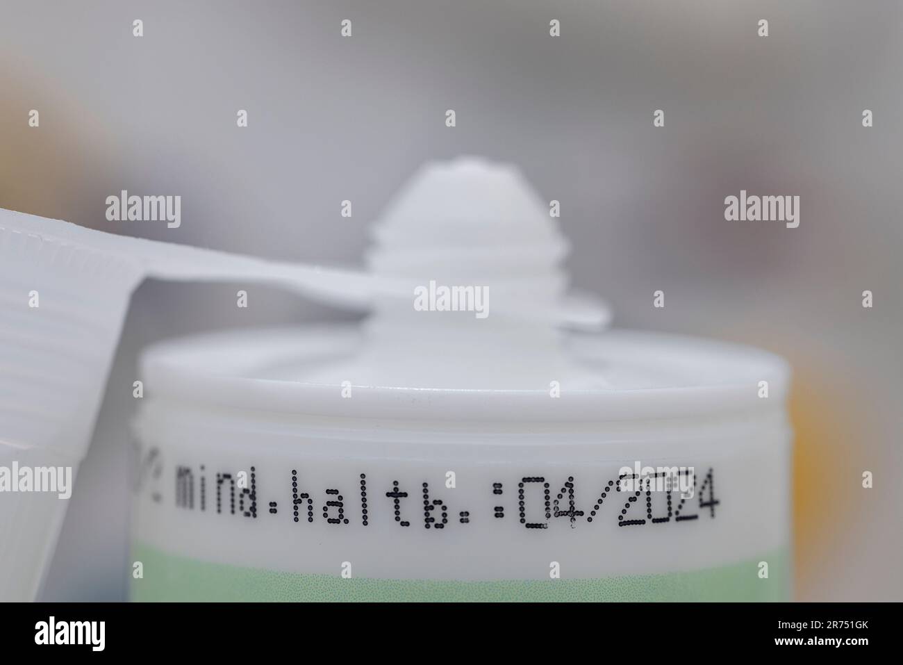 Best before date on a silicone cartridge, detail, blur Stock Photo - Alamy