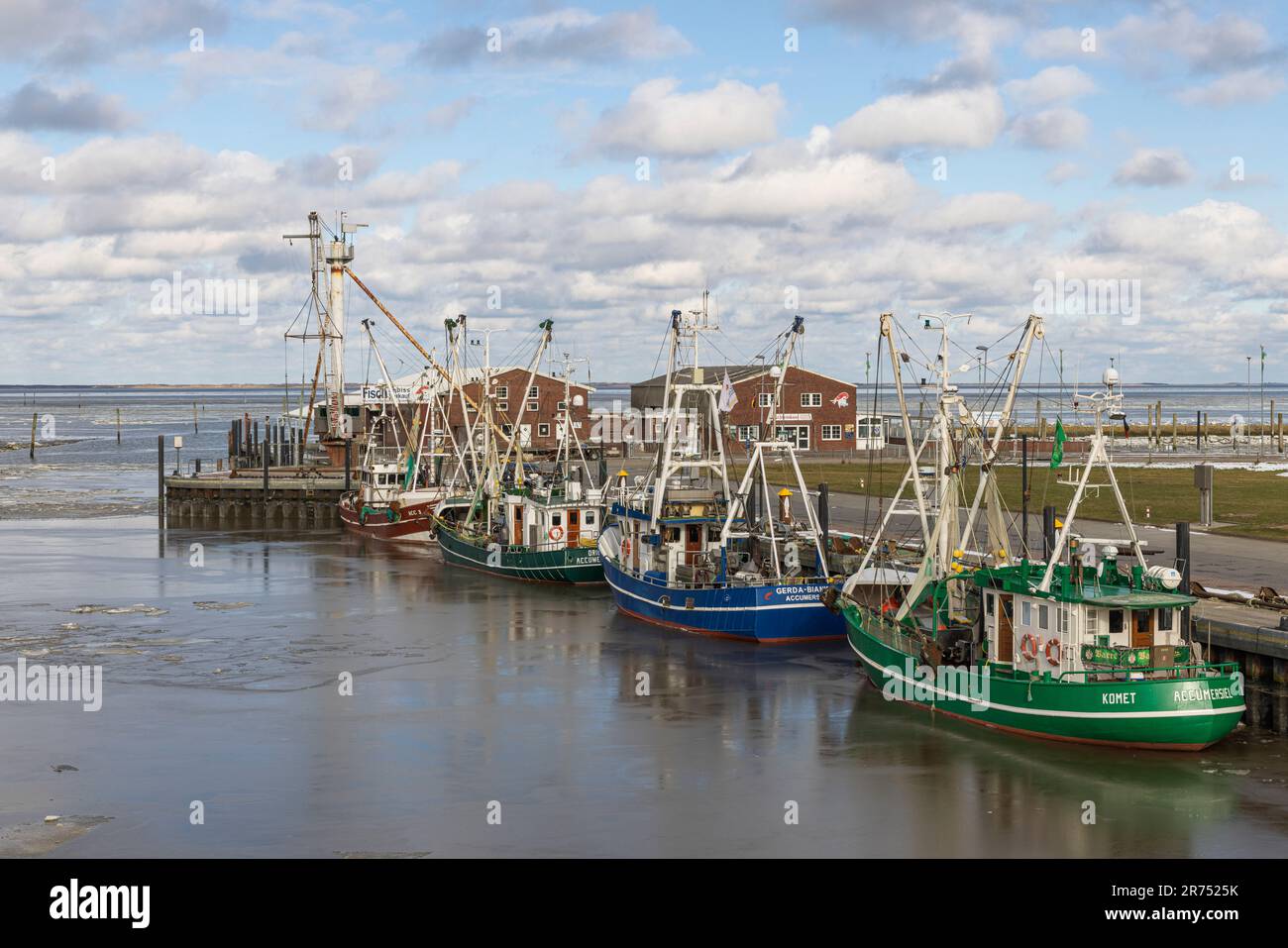 Winter atmosphere, icy harbor, fishing port of Dornumersiel, Accumersiel, East Frisia, Lower Saxony, Stock Photo