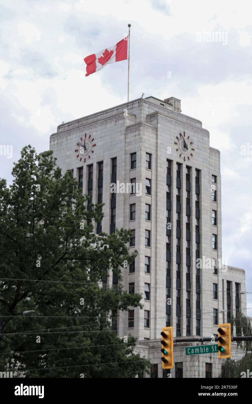 A picture of Vancouver City Hall with a backdrop of grey clouds Stock ...