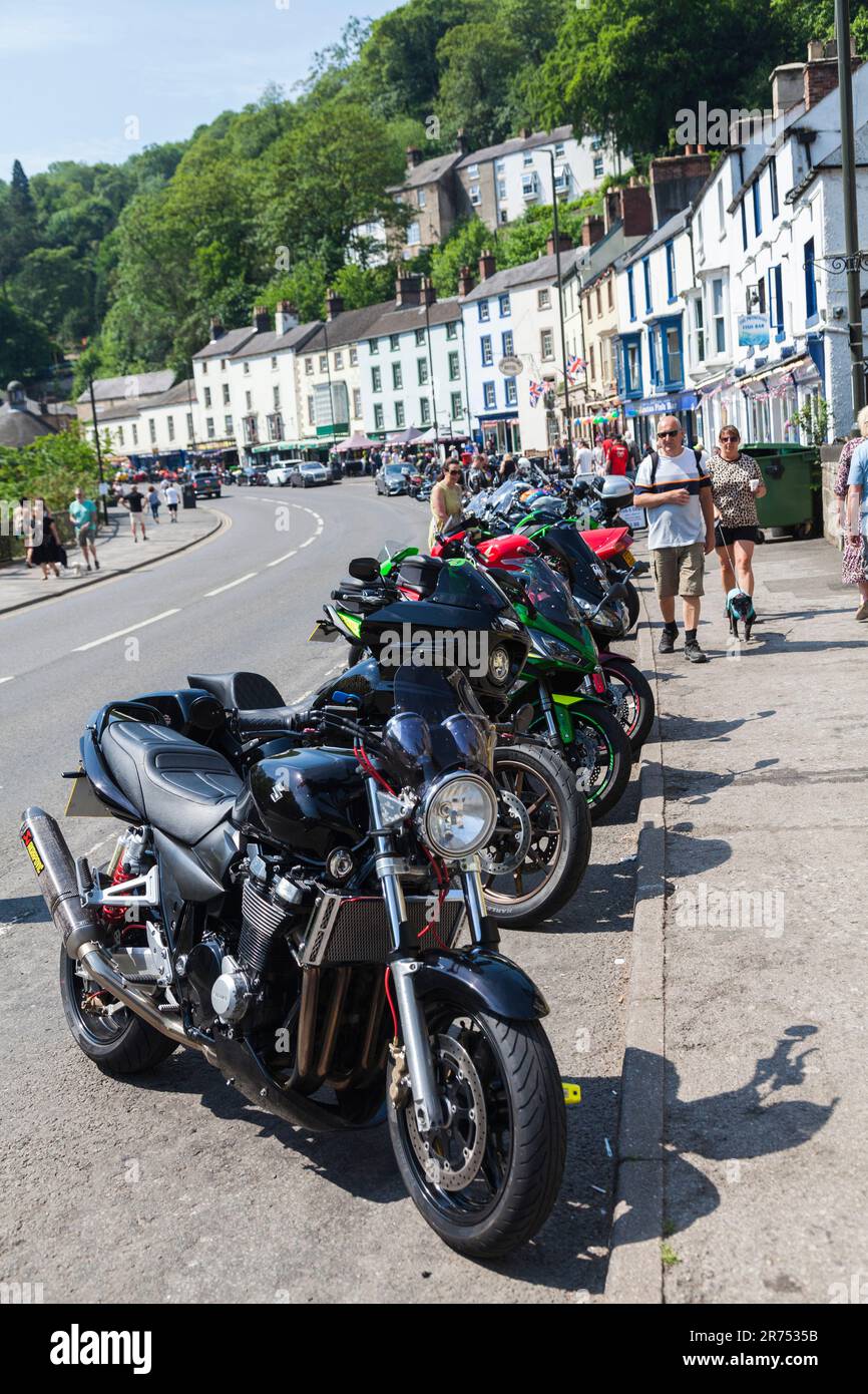 Numerous motor bikes parked up on main street in Matlock Bath