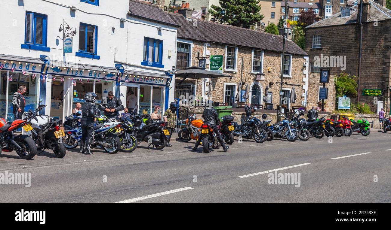 Numerous motor bikes parked up on main street in Matlock Bath