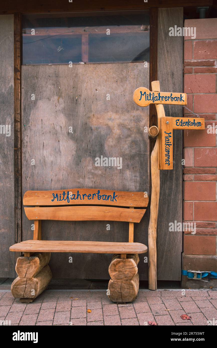 Destination Bench Wooden hitchhiking bench (Mitfahrerbank) with destination signs in St ...